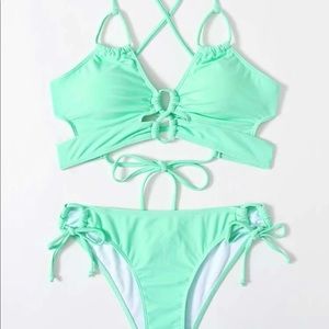 New without tags. Super cute seafoam green swimsuit.